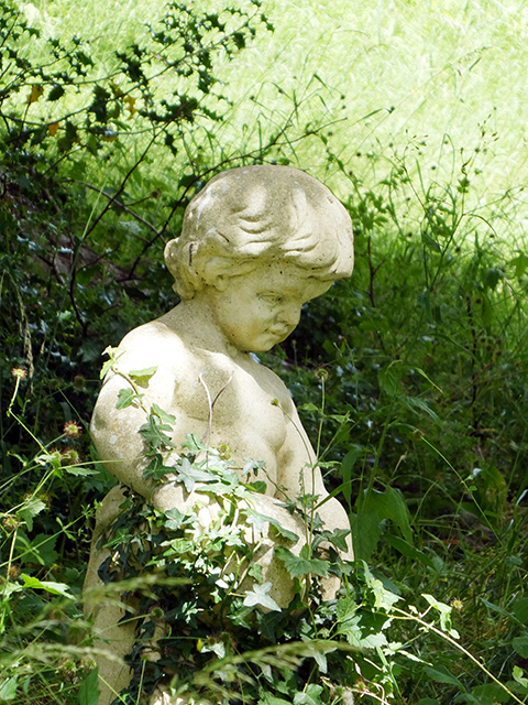 A cherub statue at Glansevern.