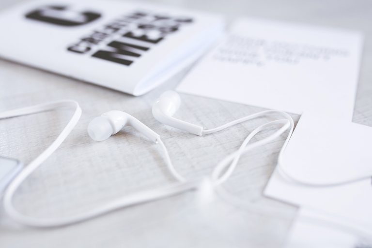 Earphones on a desk.