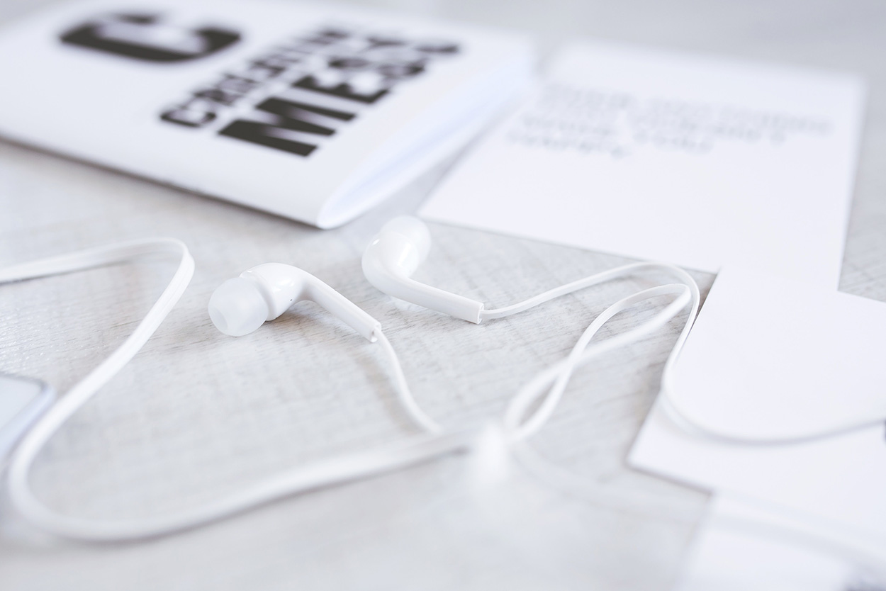 Earphones on a desk.
