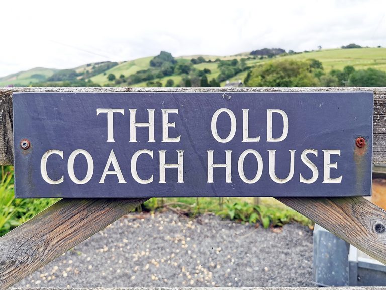 The Old Coach House sign