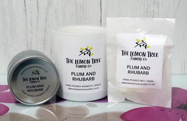 The Lemon Tree Candle Co. candle in a tin, large candle and wax melt pods.