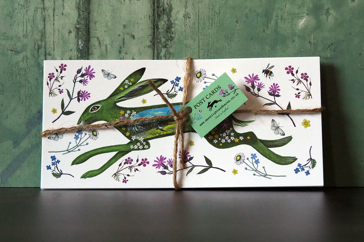 Floral Spring Hare Postcards tied with string.