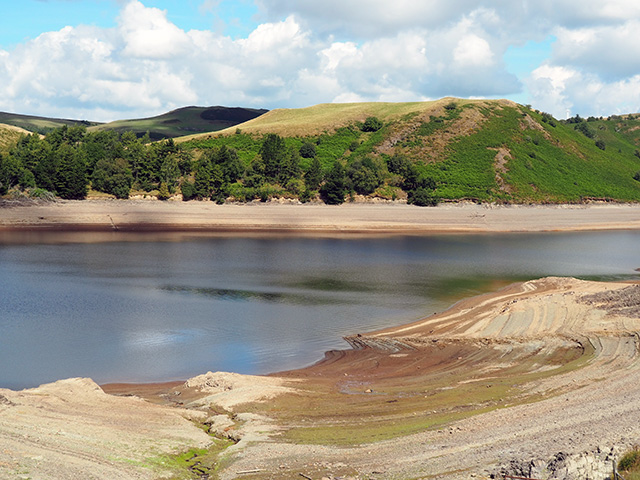 Low water levels at Clywedog Reservoir due to drought.