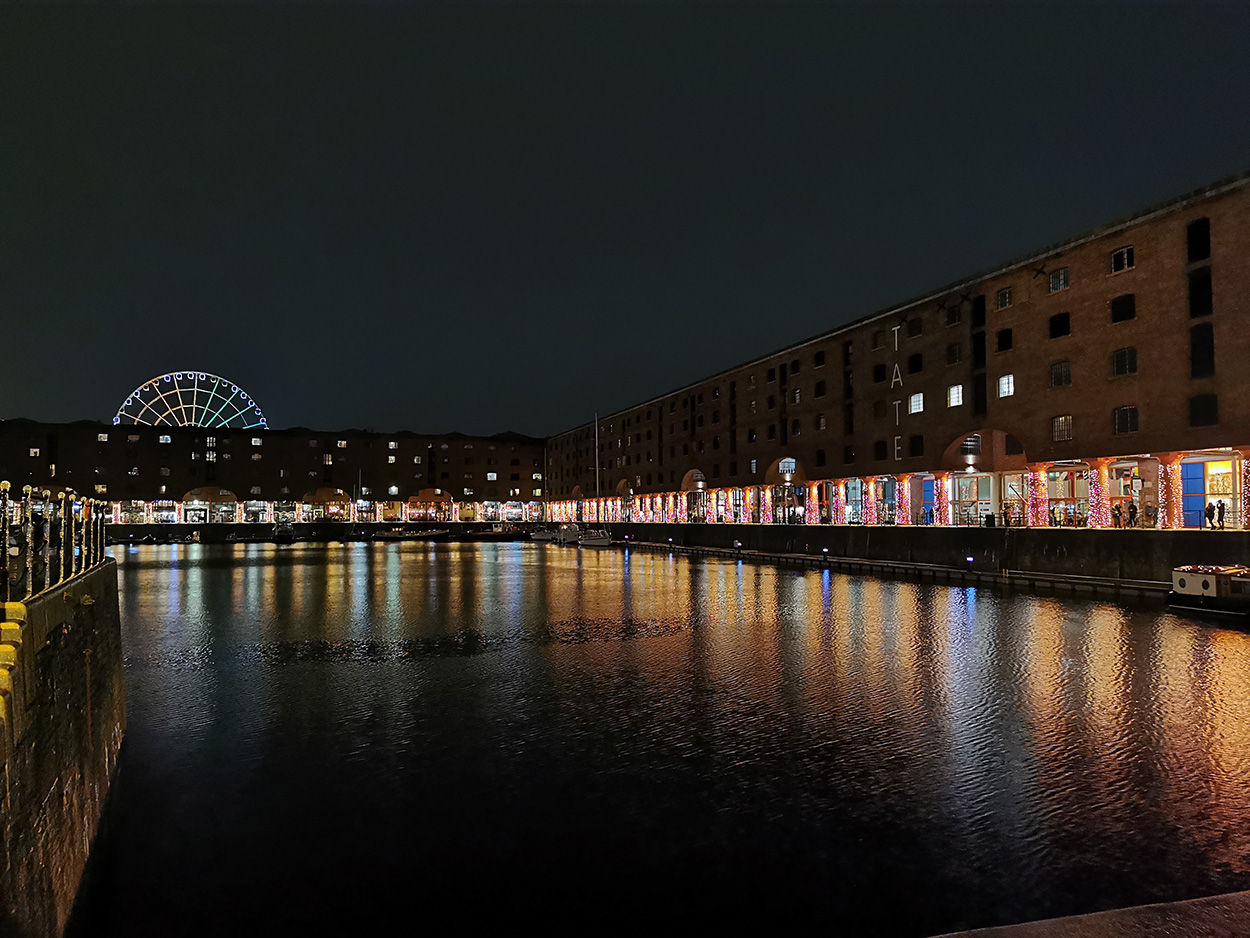 Albert Dock (Liverpool) lit up at night.