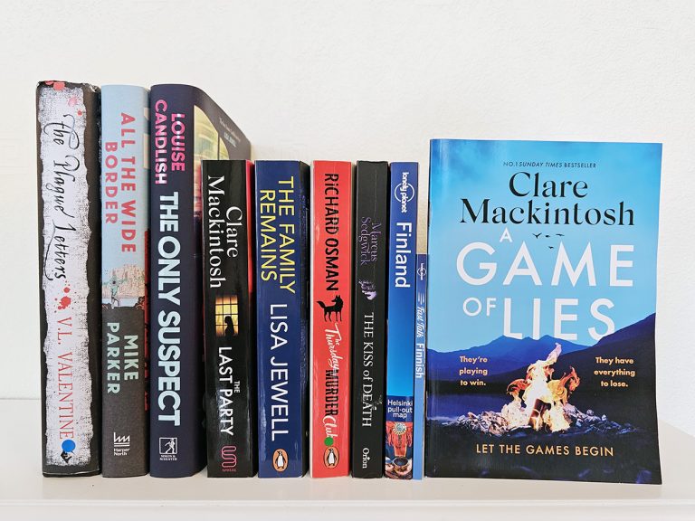 A set of books sat on a shelf.