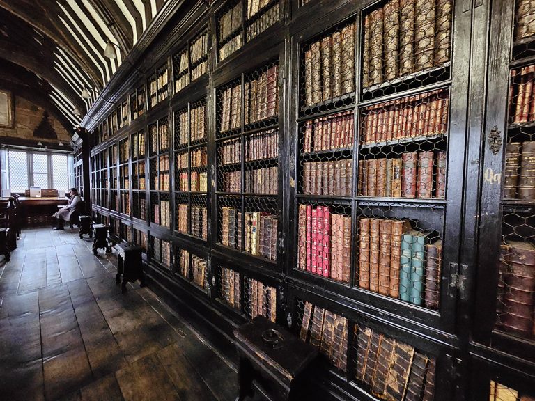 Rows of books at Chetham's Library.