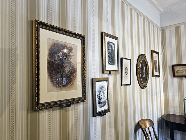 Portraits on the wall in Mary's bedroom at Charles Dickens Museum.